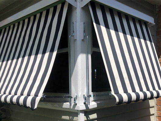 traditional-striped-canvas-awning_Traditional-Automatic-Awnings