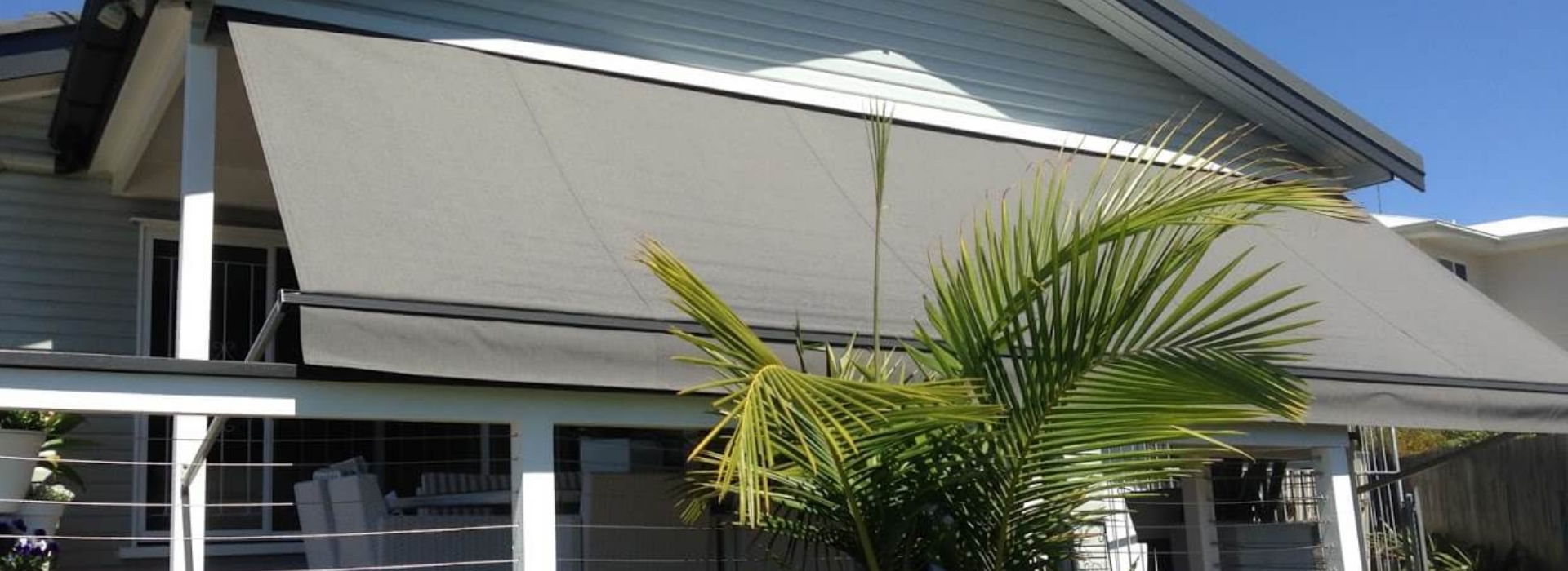 pivot-drop-arm-awnings-banner
