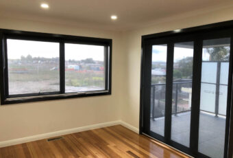 sunscreen escreen roller blinds in black