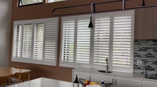 PURE WHITE PLANTATION SHUTTERS IN KITCHEN