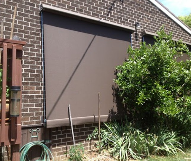 traditional motorised fixed guided awning