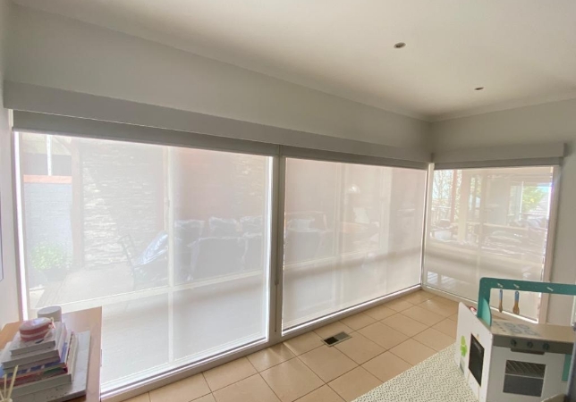 white double roller blinds with bonded pelmet