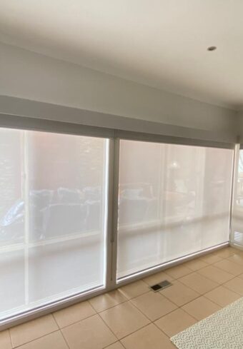 white double roller blinds with bonded pelmet