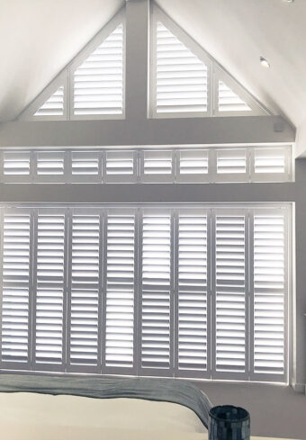Shaped-plantation shutters