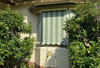 FIXED GUIDED CRANK AWNING